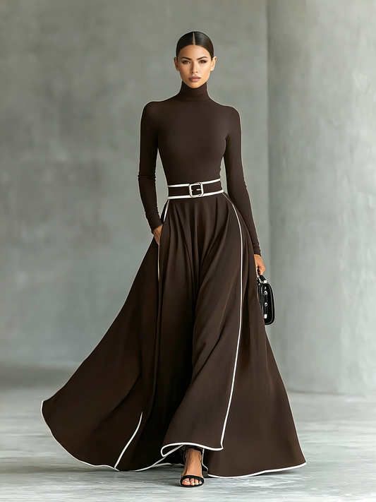 Nicole | Vestido maxi de mujer negro con costuras blancas, cuello alto, mangas largas y cintura entallada