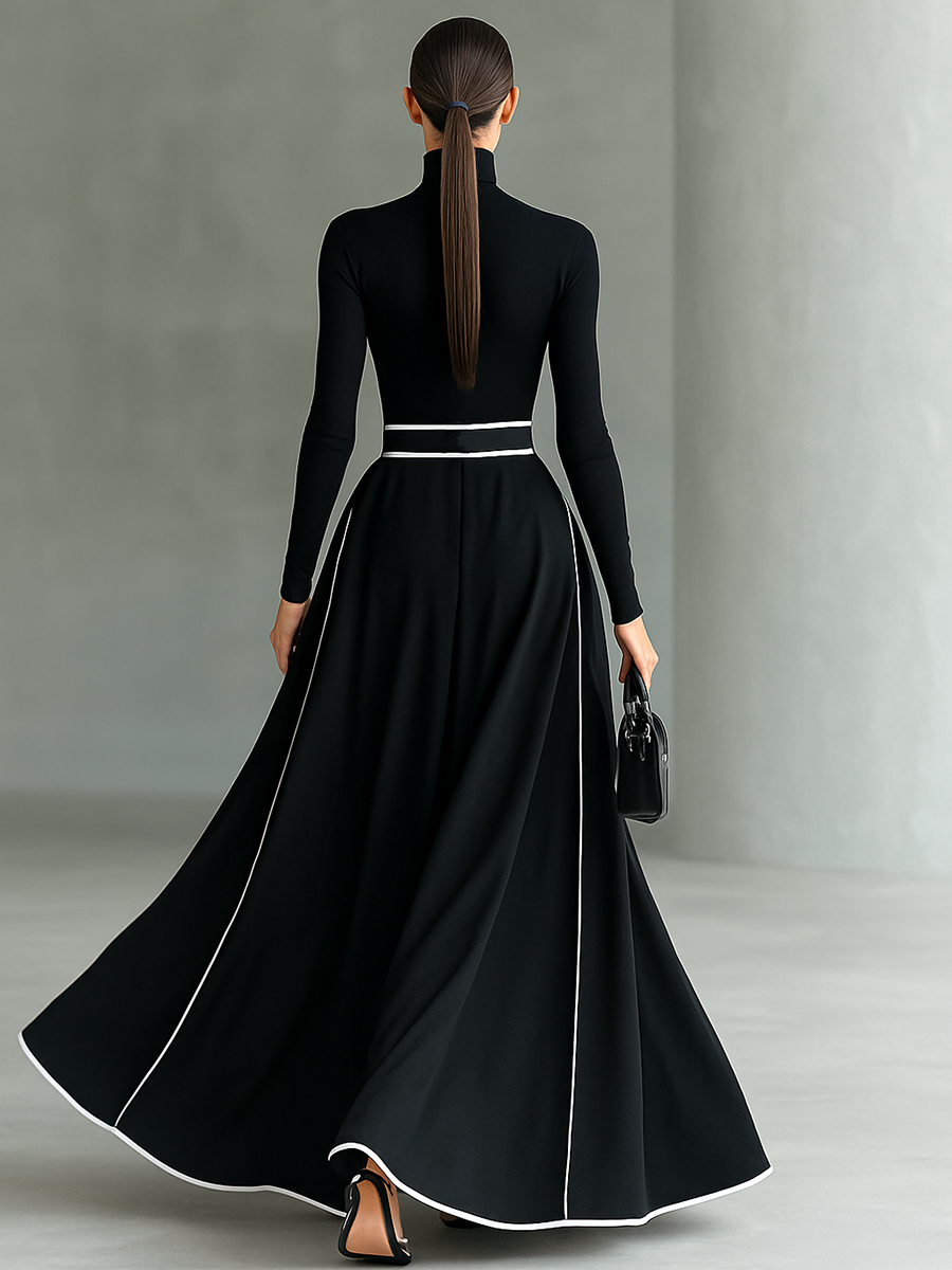 Nicole | Vestido maxi de mujer negro con costuras blancas, cuello alto, mangas largas y cintura entallada